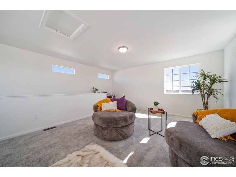 Furnished interior view inside a new home in Thompson River Ranch, Johnstown (Image 14).