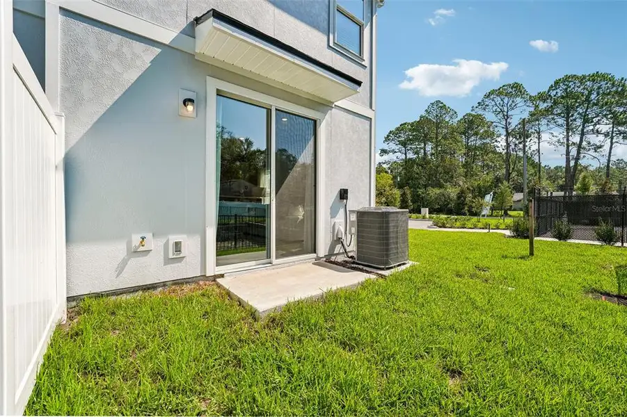 Exterior details and patio area of a home in , Jacksonville (Image 3). Exterior details and patio area of a home in , Jacksonville (Image 3).