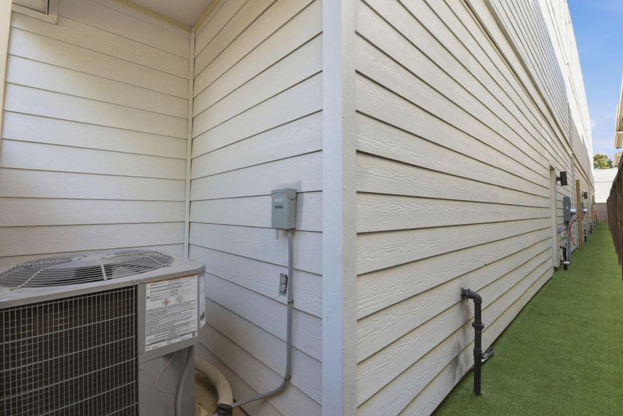 Exterior details and patio area of a home in , Houston (Image 25).