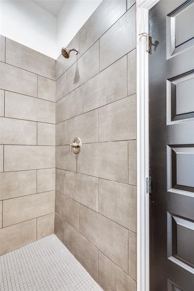 Bathroom with a tile shower