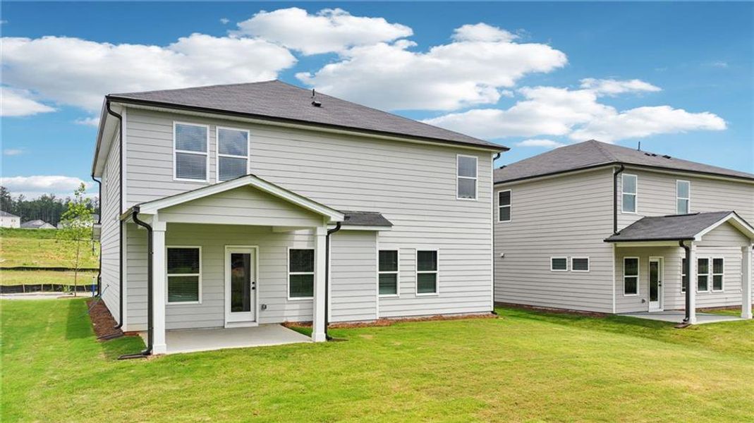 Front exterior of a new home in Vines at Mill Creek - Estate Series, Braselton, GA, highlighting curb appeal (Image 18).