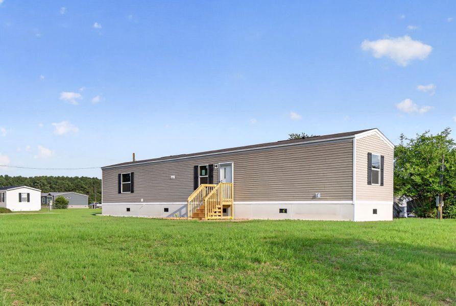 Exterior details and patio area of a home in , Harleyville (Image 21).