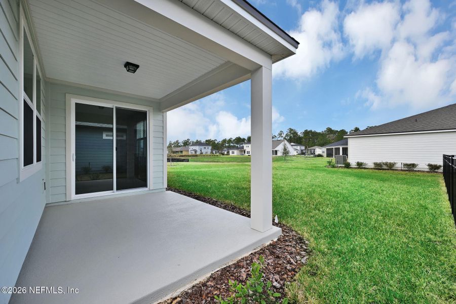 Exterior details and patio area of a home in Hyland Trail, Green Cove Springs (Image 21).