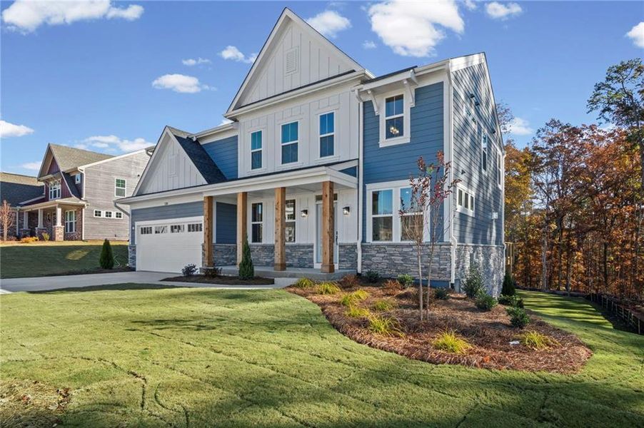 Front exterior of a new home in Pickens Bluff, Hiram, GA, highlighting curb appeal (Image 2).
