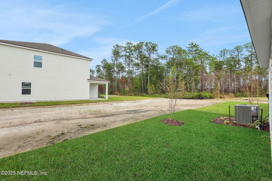 Exterior details and patio area of a home in Brook Forest, St. Augustine (Image 22).