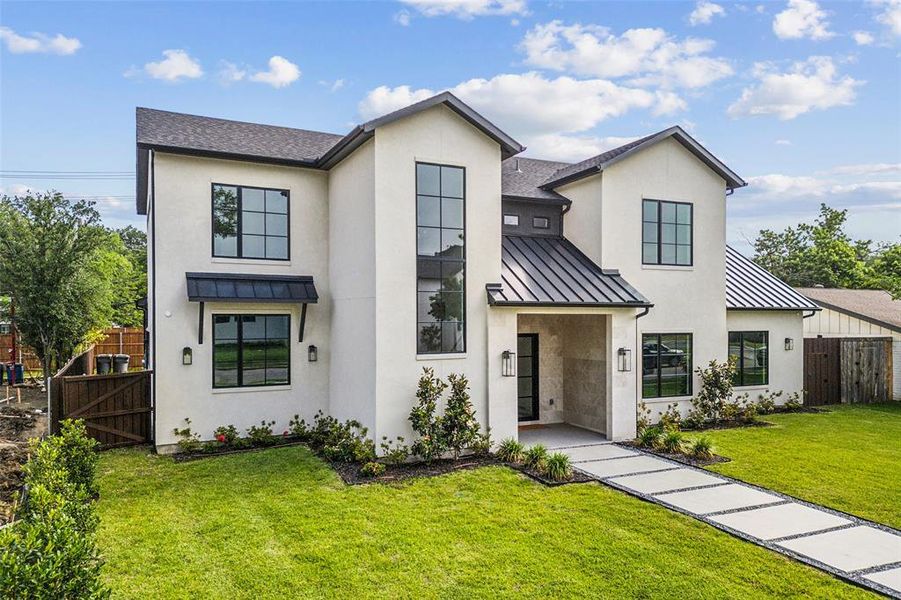 Spacious new construction home with black framed windows and gorgeous finishouts. Spacious new construction home with black framed windows and gorgeous finishouts.