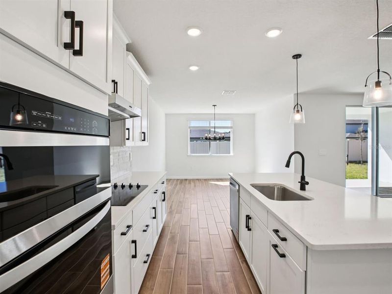 Furnished interior view inside a new home in Two Rivers - Signature Series, Zephyrhills (Image 5). Furnished interior view inside a new home in Two Rivers - Signature Series, Zephyrhills (Image 5).