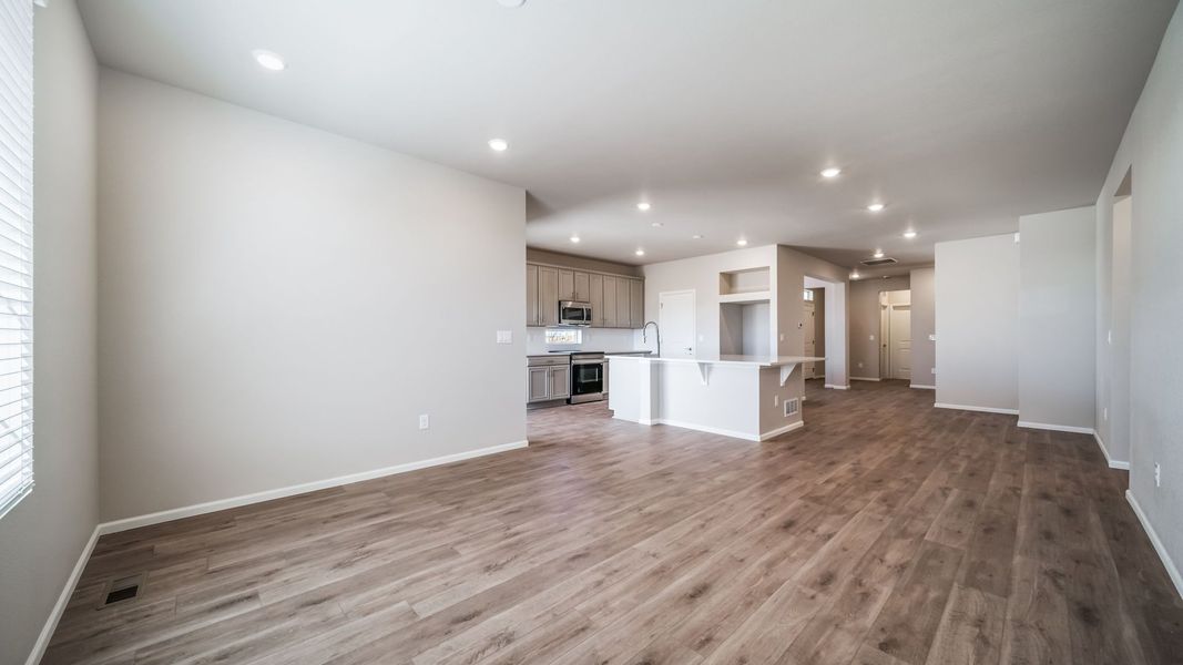 Spacious, unfurnished interior of a new home in The Reserve at Green Valley Ranch, Aurora (Image 12).