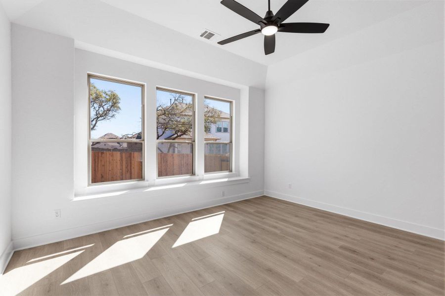 Primary Bedroom with elevated ceiling