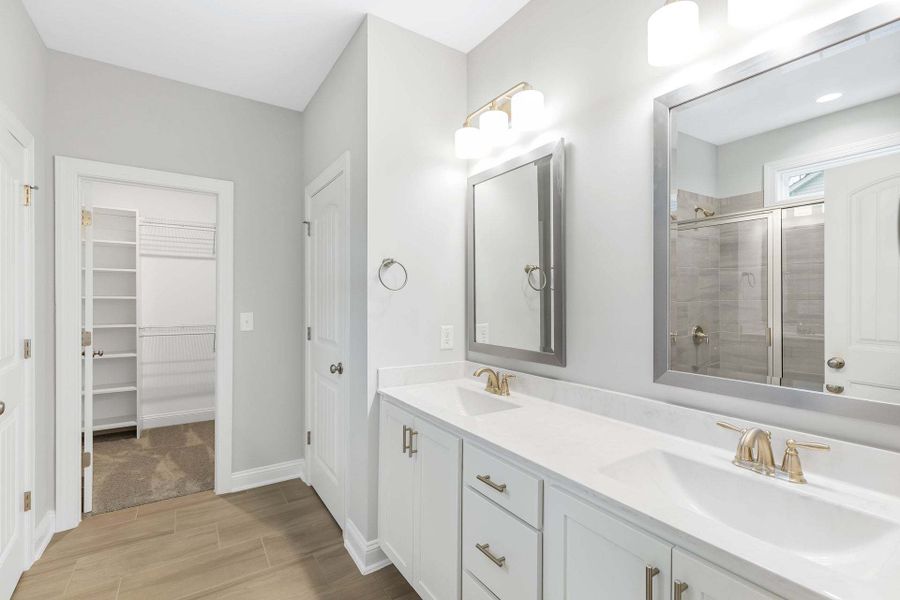 Representative furnished interior of a home built from the Garland by Caviness & Cates Communities in Bartlett Manor, Youngsville (Image 218). Representative furnished interior of a home built from the Garland by Caviness & Cates Communities in Bartlett Manor, Youngsville (Image 218).