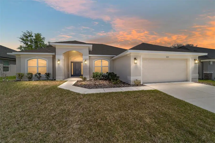 Front exterior of a new home in Brookhaven, Ocala, FL, highlighting curb appeal (Image 26).