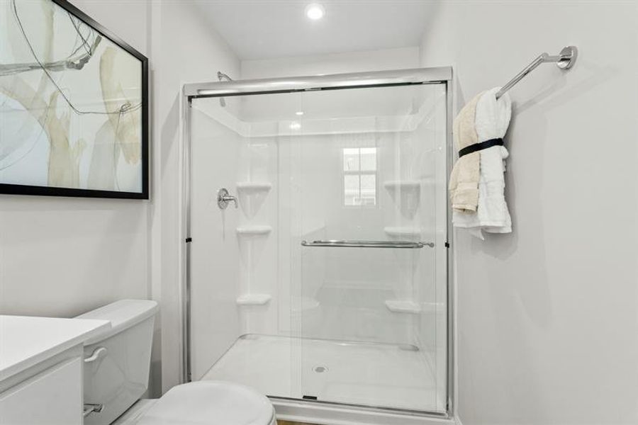 Representative furnished interior of a home built from the Woodford by Ryan Homes in Oakwood Trace, Fairburn (Image 29).