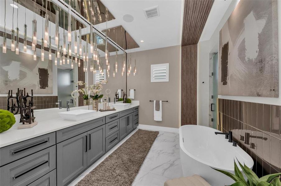 Relax and unwind in your spa-like primary bathroom