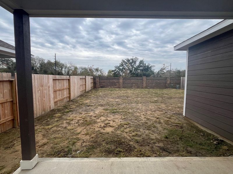 Enjoy relaxing on your covered back patio with family and friends and you will love having no back neighbors.