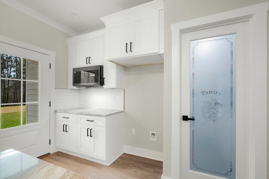 Furnished interior view inside a new home in , Calhoun (Image 10).