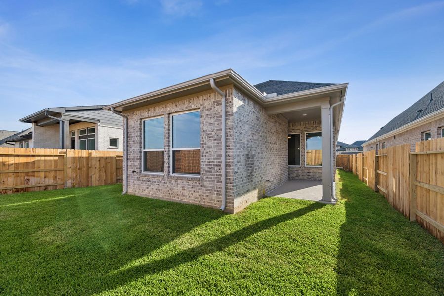 Exterior details and patio area of a home in The Grand Prairie 40’, Hockley (Image 4). Exterior details and patio area of a home in The Grand Prairie 40’, Hockley (Image 4).