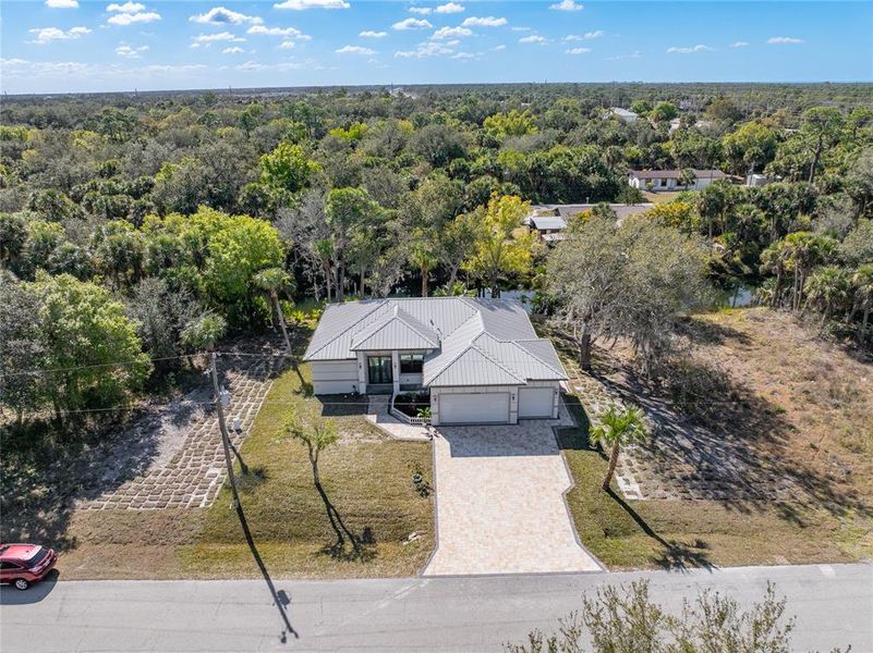 Front exterior of a new home in , Punta Gorda, FL, highlighting curb appeal (Image 23).