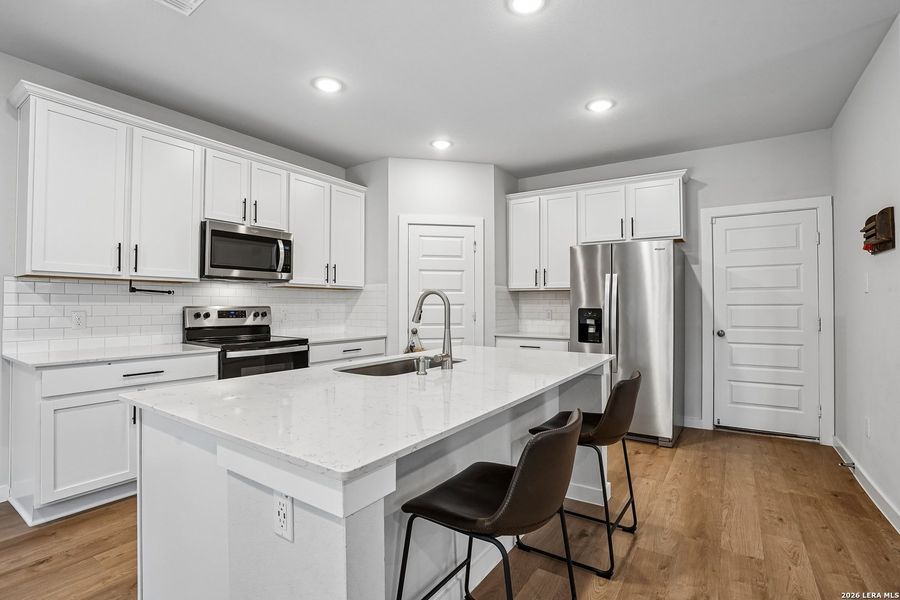Furnished interior view inside a new home in University Village, San Antonio (Image 15).