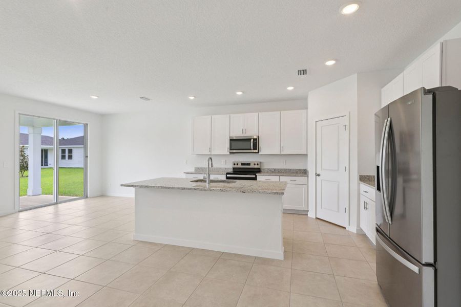 Furnished interior view inside a new home in Flagler Village - Signature Series, Palm Coast (Image 8).