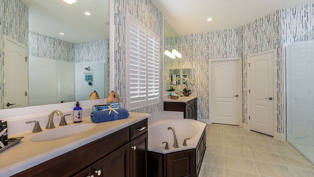 Furnished interior view inside a new home in SkySail Real Estate and Homes for Sale in Naples, FL - Neal Communities, Naples (Image 21).