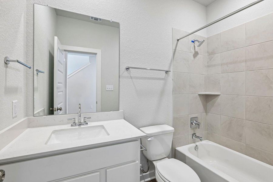 Furnished interior view inside a new home in Avery Centre, Round Rock (Image 12).