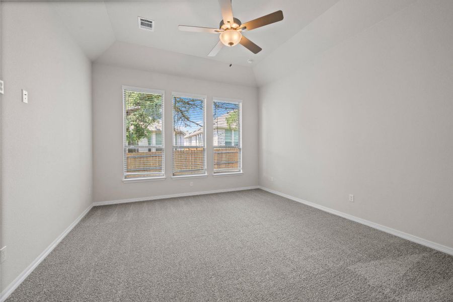 Primary Bedroom with elevated ceiling