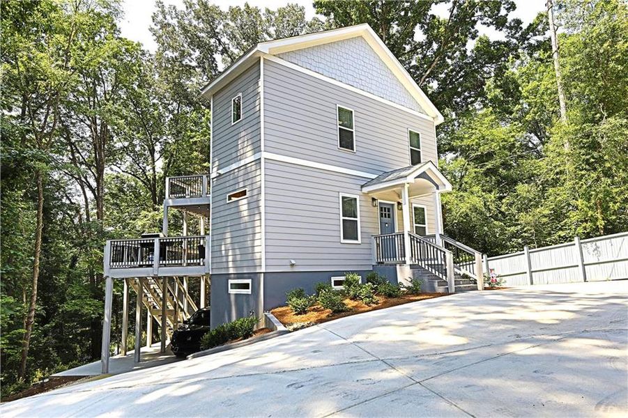 Front exterior of a new home in , Austell, GA, highlighting curb appeal (Image 15).