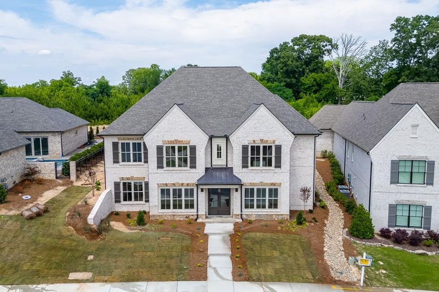 Front exterior of a new home in Chateau E´lan, Braselton, GA, highlighting curb appeal (Image 2). Front exterior of a new home in Chateau E´lan, Braselton, GA, highlighting curb appeal (Image 2).