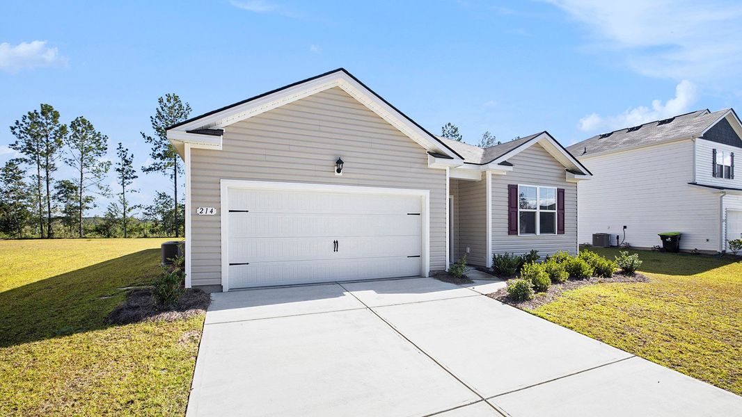 Front exterior of a new home in Summerville, Darlington, SC, highlighting curb appeal (Image 2). Front exterior of a new home in Summerville, Darlington, SC, highlighting curb appeal (Image 2).