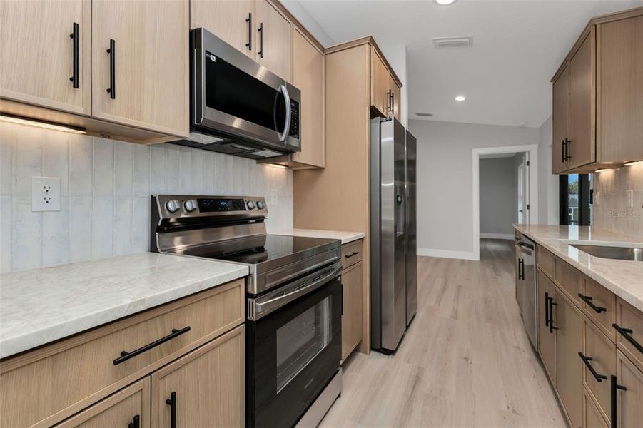Furnished interior view inside a new home in , Punta Gorda (Image 5).