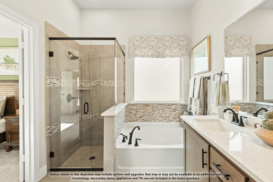 Master bathroom with glass walk-in shower, soaking tub, double vanity, and tile accents Master bathroom with glass walk-in shower, soaking tub, double vanity, and tile accents