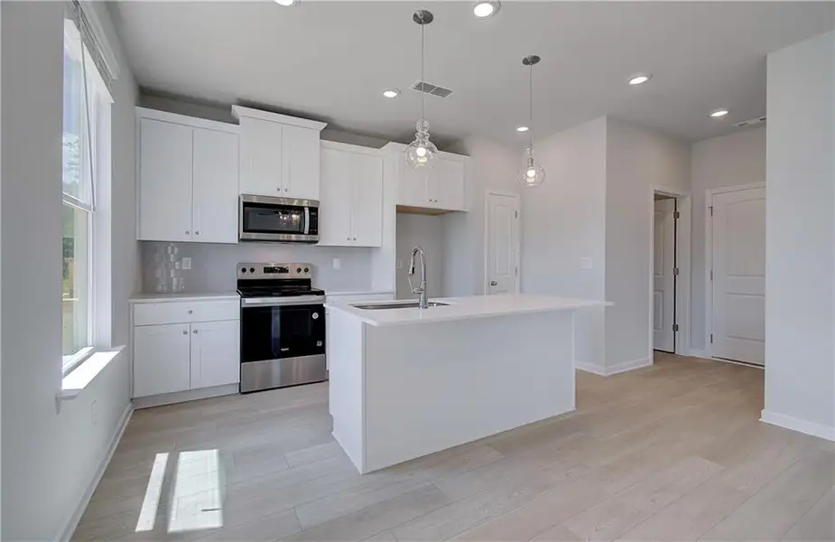 Furnished interior view inside a new home in Enclave at Evergreen, Fairburn (Image 7). Furnished interior view inside a new home in Enclave at Evergreen, Fairburn (Image 7).