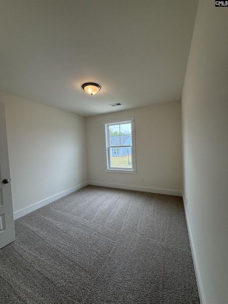 Spacious, unfurnished interior of a new home in Cottages at Roofs Pond, West Columbia (Image 47).