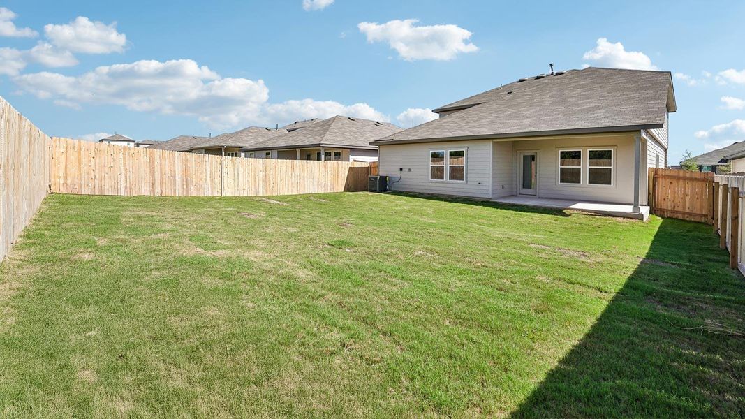Exterior details and patio area of a home in Carillon, Manor (Image 2).