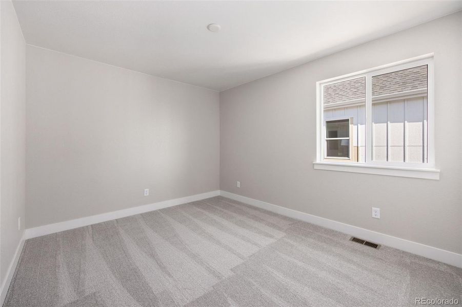 Spacious, unfurnished interior of a new home in Trailside on Harmony, Timnath (Image 22).