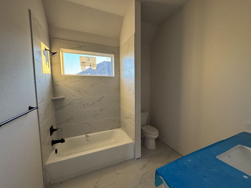 In-progress construction of a new home in Coyote Crossing, Godley, TX (Image 11).