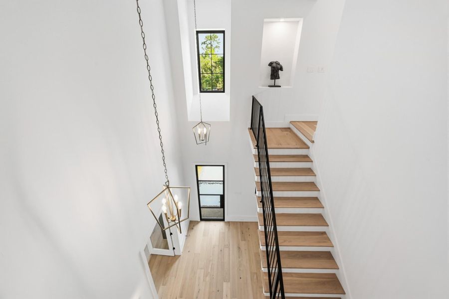 The double height foyer brings tons of light upstairs!