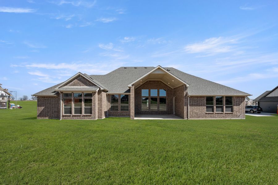 Exterior details and patio area of a home in Paloma Ranch, Justin (Image 19).