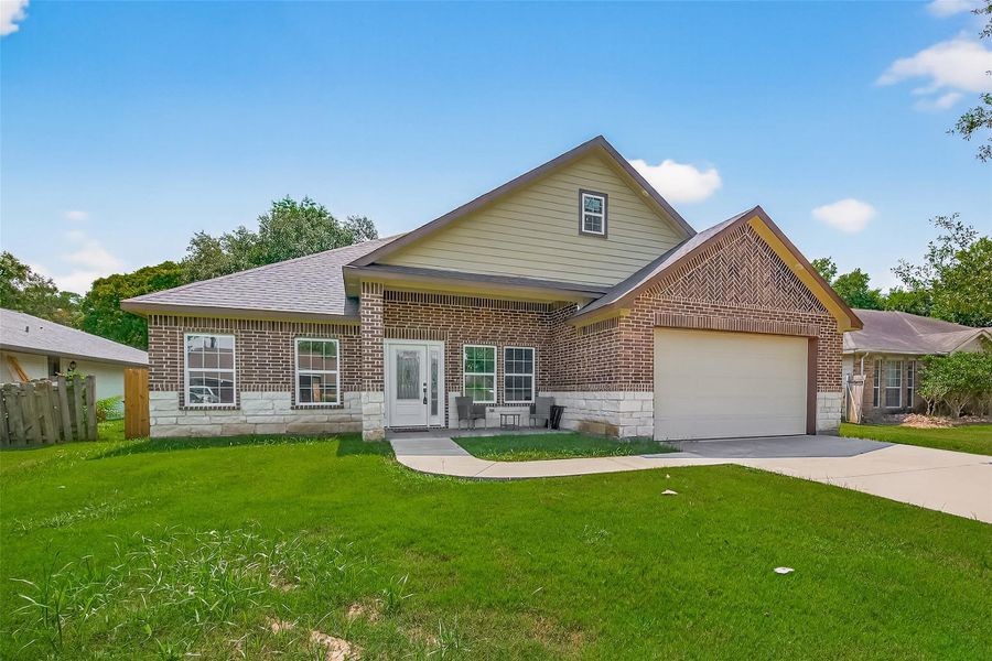 Front exterior of a new home in , Crosby, TX, highlighting curb appeal (Image 1).
