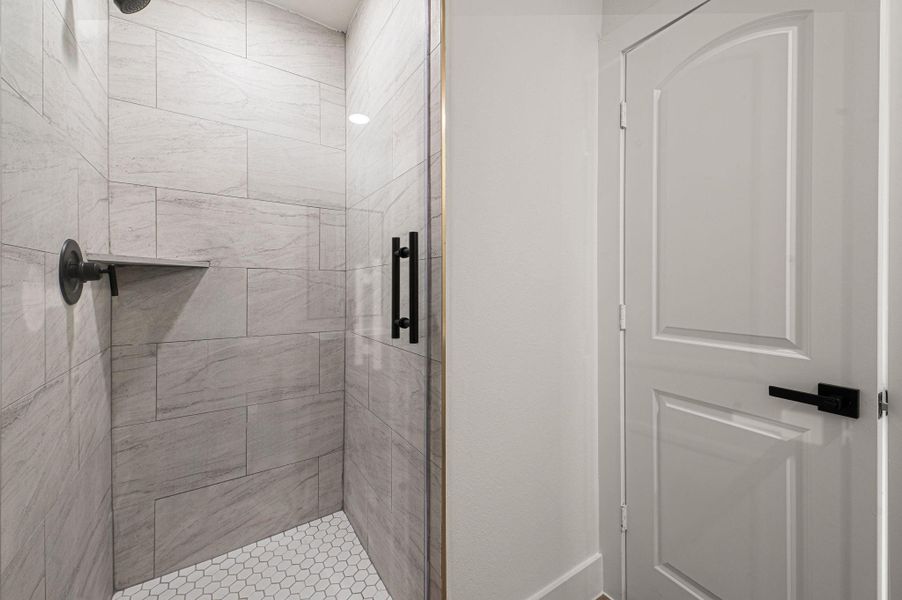 Full shower and bathroom in the flex space for overnight guests.