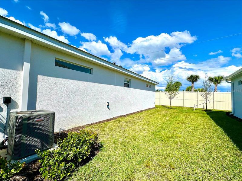 Exterior details and patio area of a home in Palm Lake at Coco Bay, Englewood (Image 26).