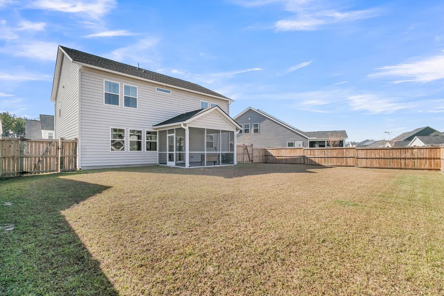 Exterior details and patio area of a home in Sweetgrass at Summers Corner: Arbor Collection, Summerville (Image 24). Exterior details and patio area of a home in Sweetgrass at Summers Corner: Arbor Collection, Summerville (Image 24).