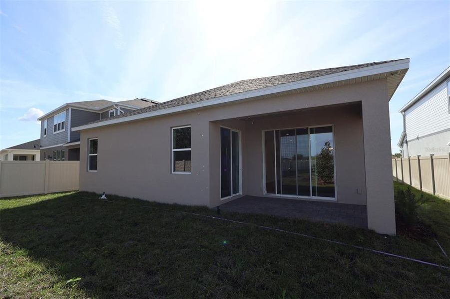 Exterior details and patio area of a home in Bay Lake Farms, St. Cloud (Image 4).