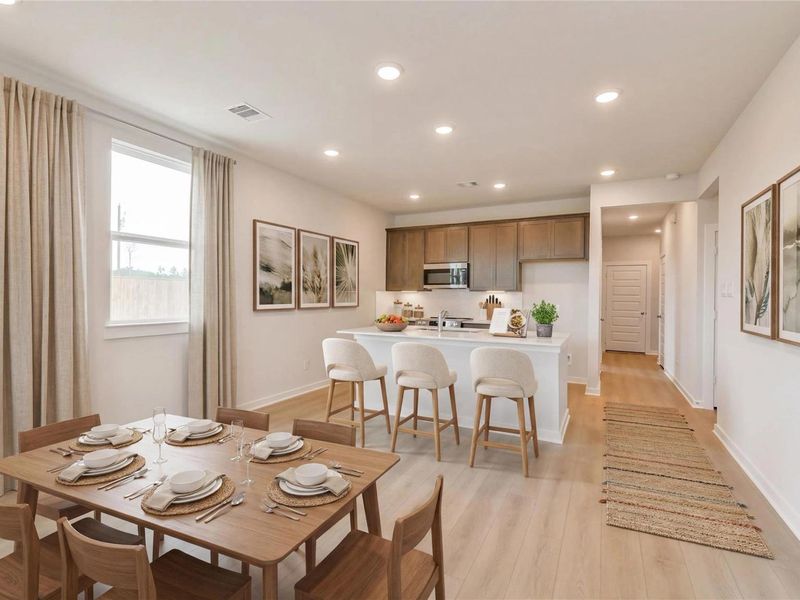 Furnished interior view inside a new home in Spring Branch Crossing, Conroe (Image 6).