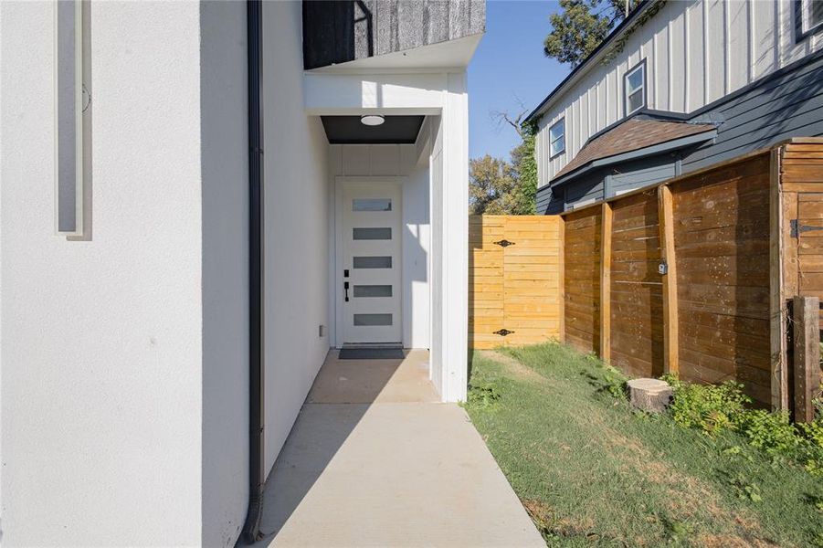 Property entrance with board and batten siding Property entrance with board and batten siding