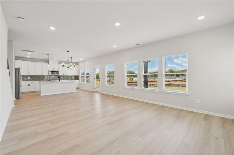 Spacious, unfurnished interior of a new home in Vines at Mill Creek - Estate Series, Braselton (Image 15). Spacious, unfurnished interior of a new home in Vines at Mill Creek - Estate Series, Braselton (Image 15).