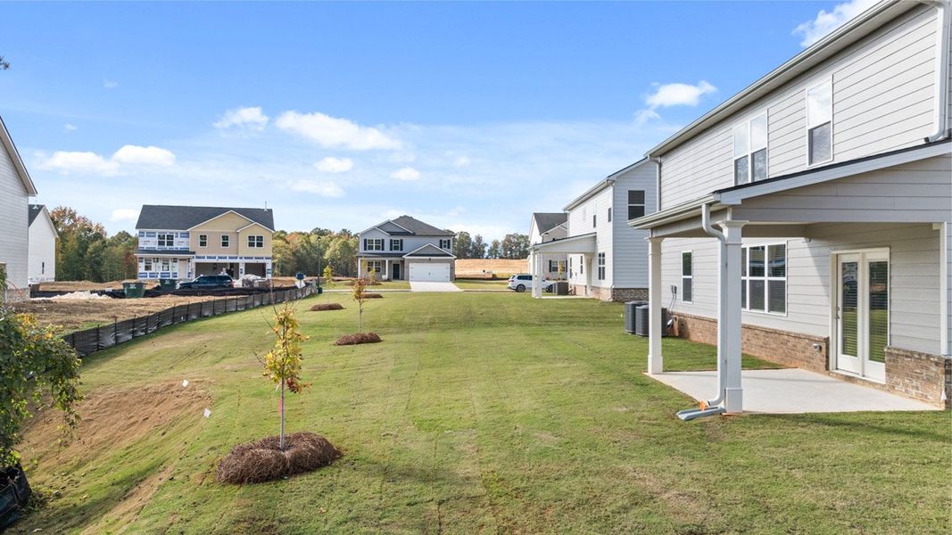 Exterior details and patio area of a home in Brooks Station, Dacula (Image 3).
