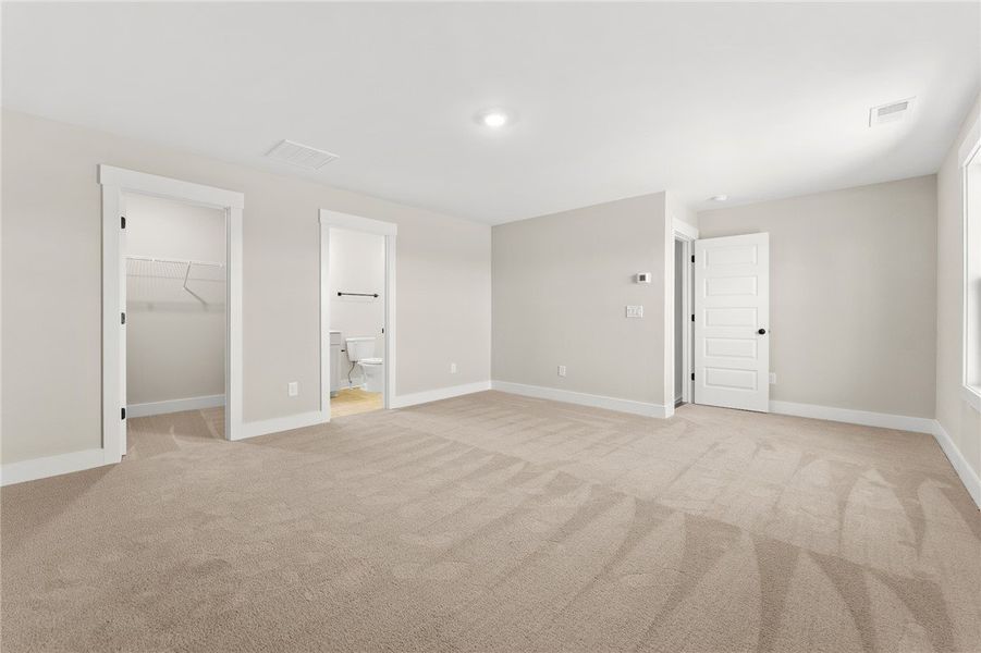 This spacious room offers comfort and versatility,