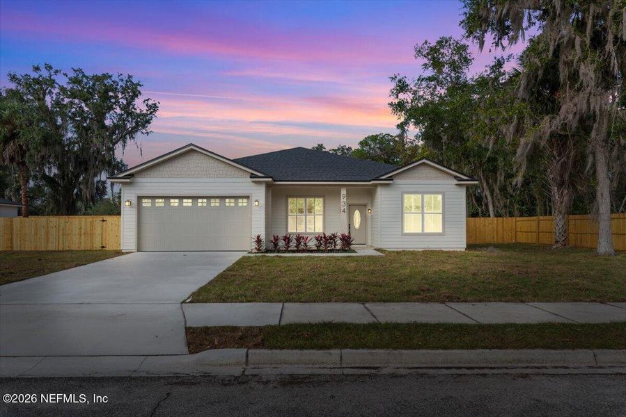 Front exterior of a new home in , Orange Park, FL, highlighting curb appeal (Image 25).