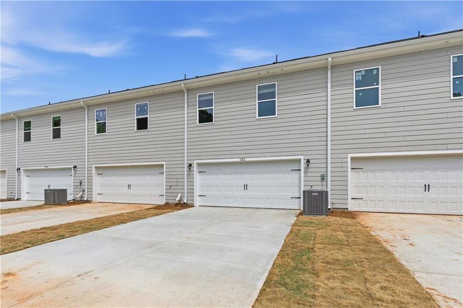 Exterior details and patio area of a home in Avery Landing, McDonough (Image 19).